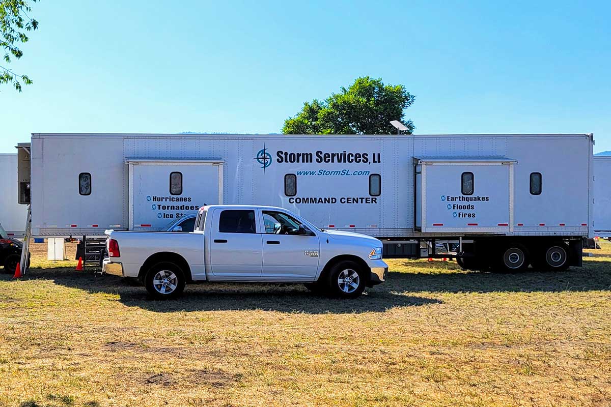 An on-site commuications and command trailer deployed at a base camp.