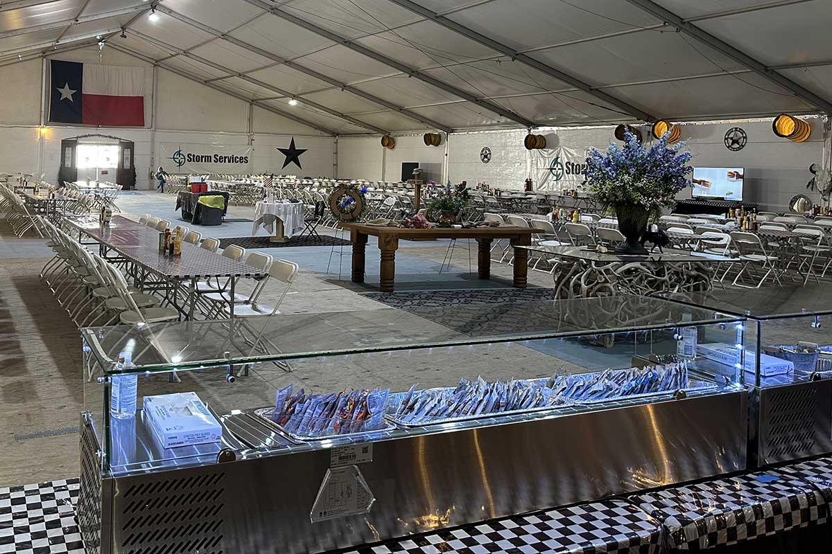 food service and dining area in tent deployed at a base camp.