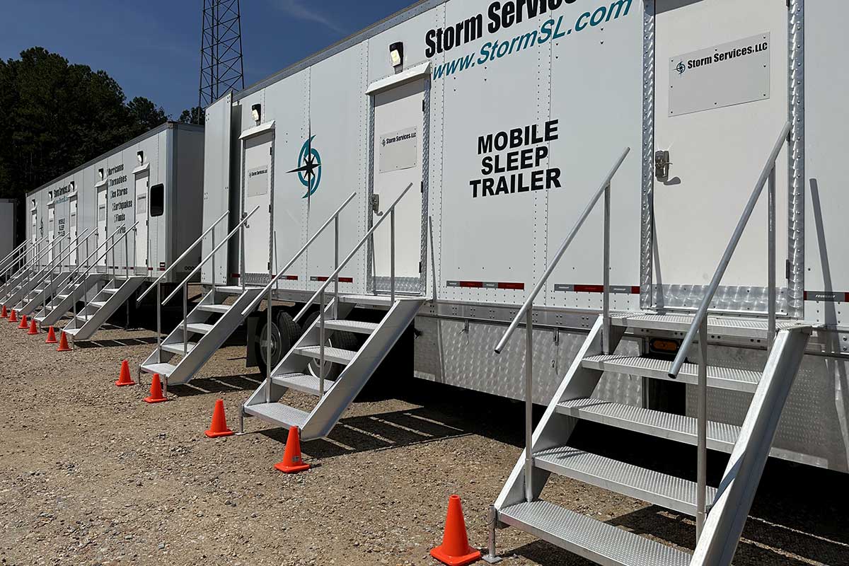 Exterior view of a multi-room sleep trailer.